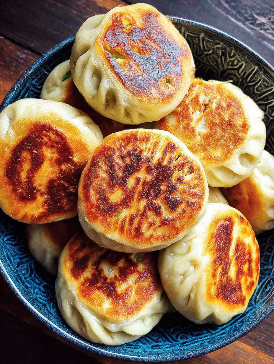 A bowl of vegan pan-fried buns.